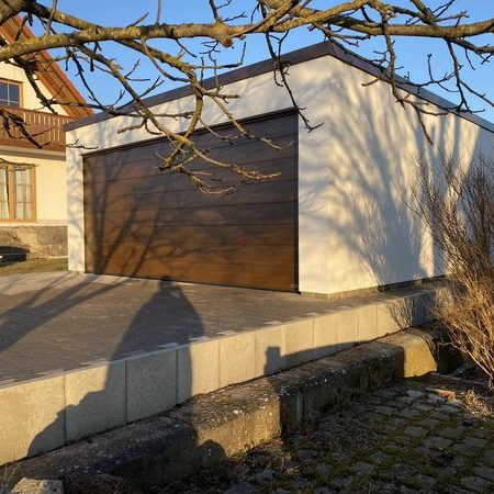 Hörmann Sektionaltor braun Fertiggarage Sandwichpaneele